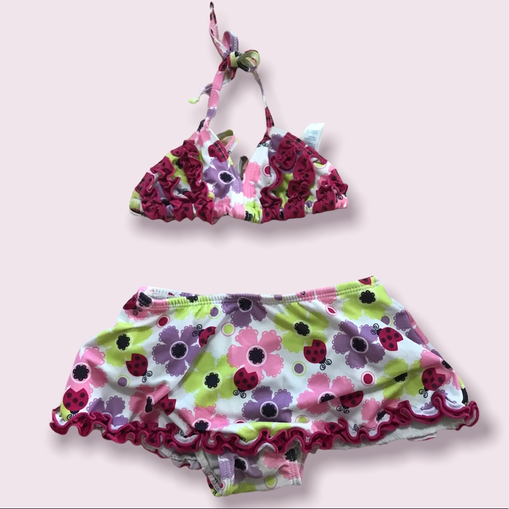 Flowers and ladybugs two-piece swimsuit. Size 18 months.